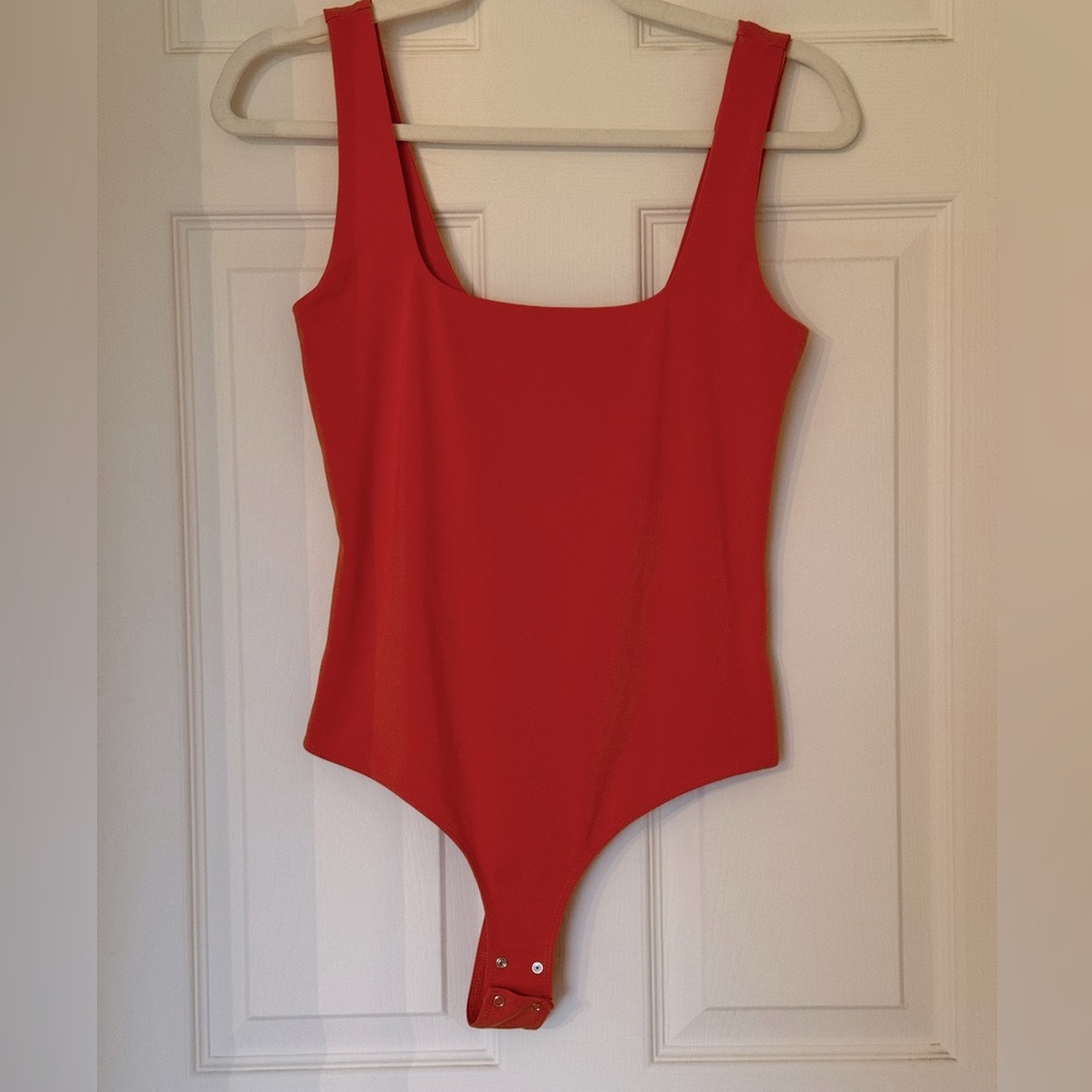 Orange bodysuit